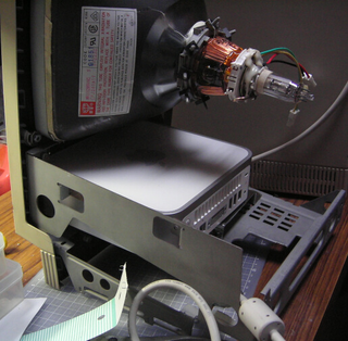 Illustration for article titled Hacker Stuffs a Mac Mini Inside an Apple SE/30